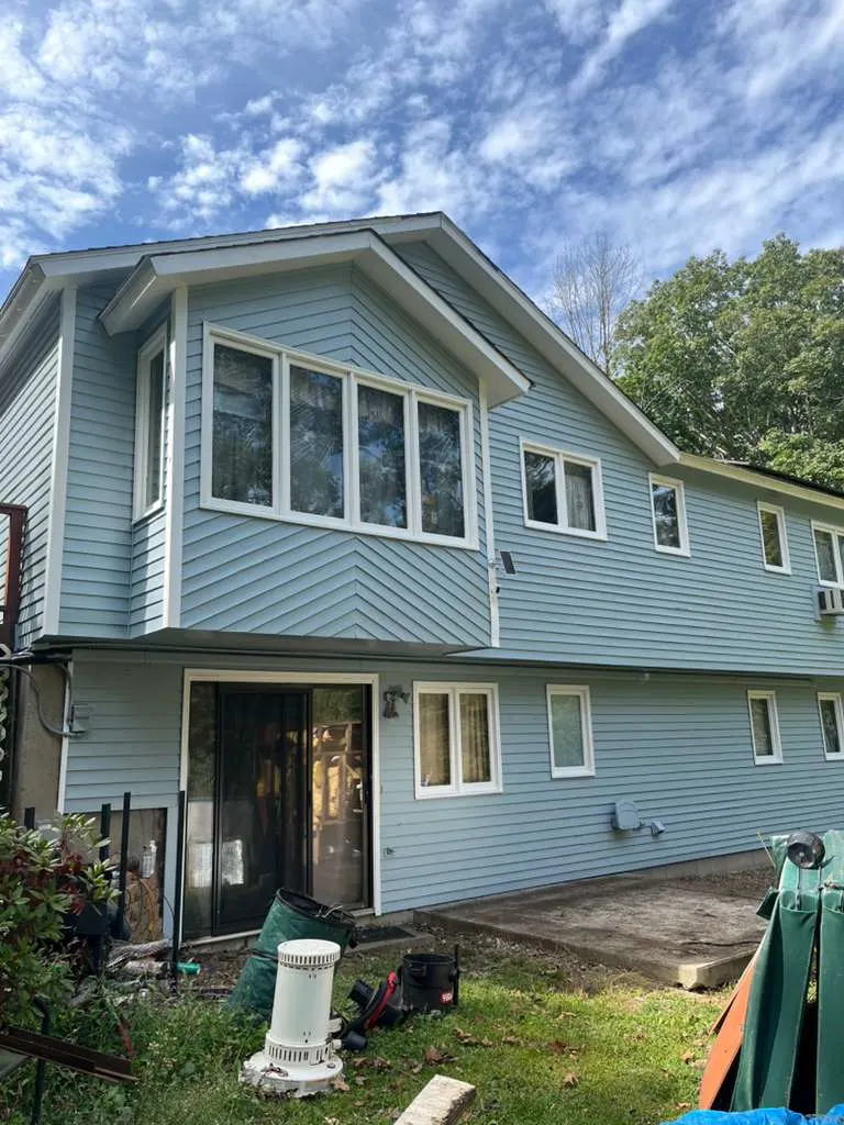 Two-story exterior in coastal blue