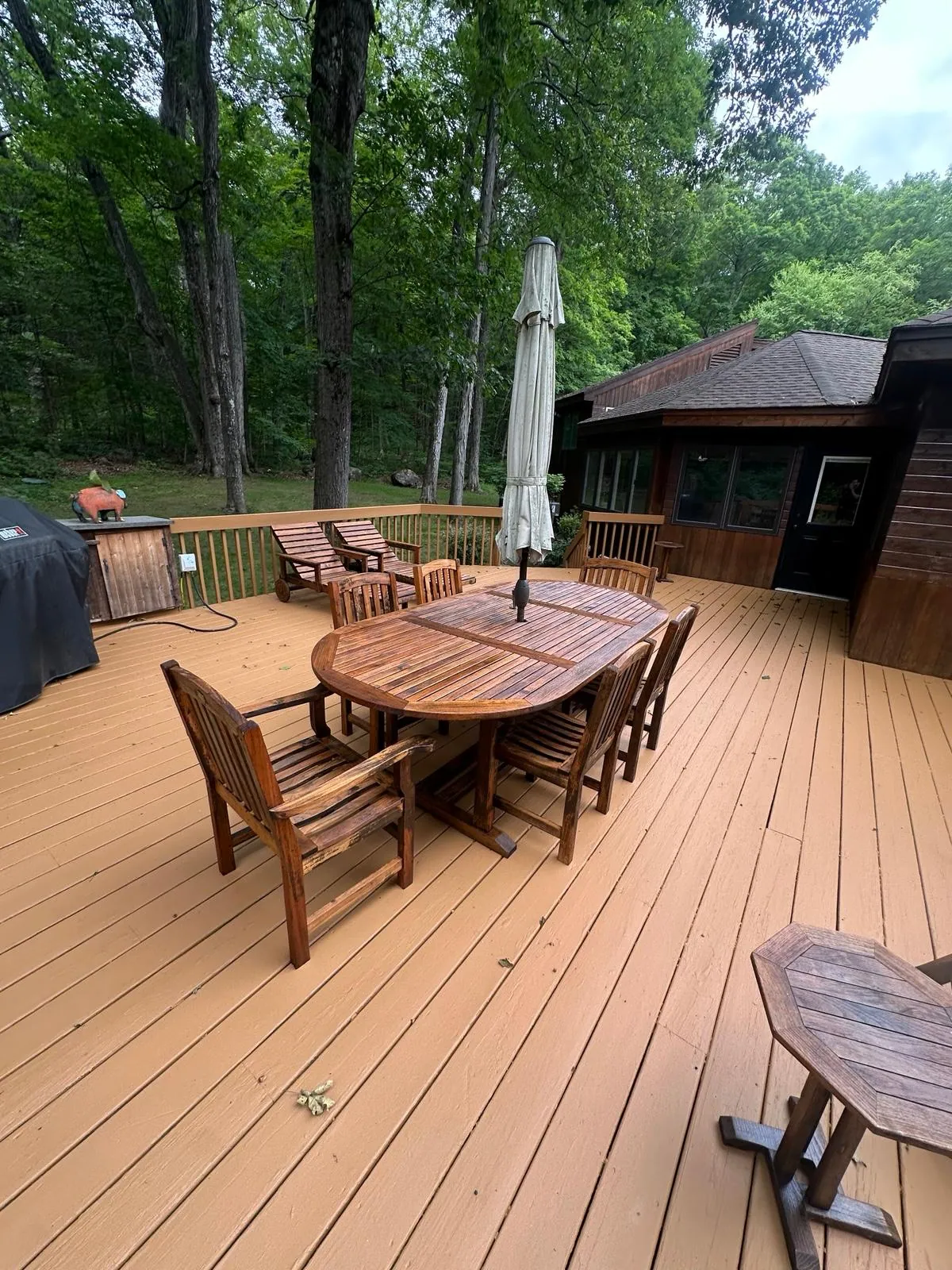 Deck boards and railings restored, cedar tone