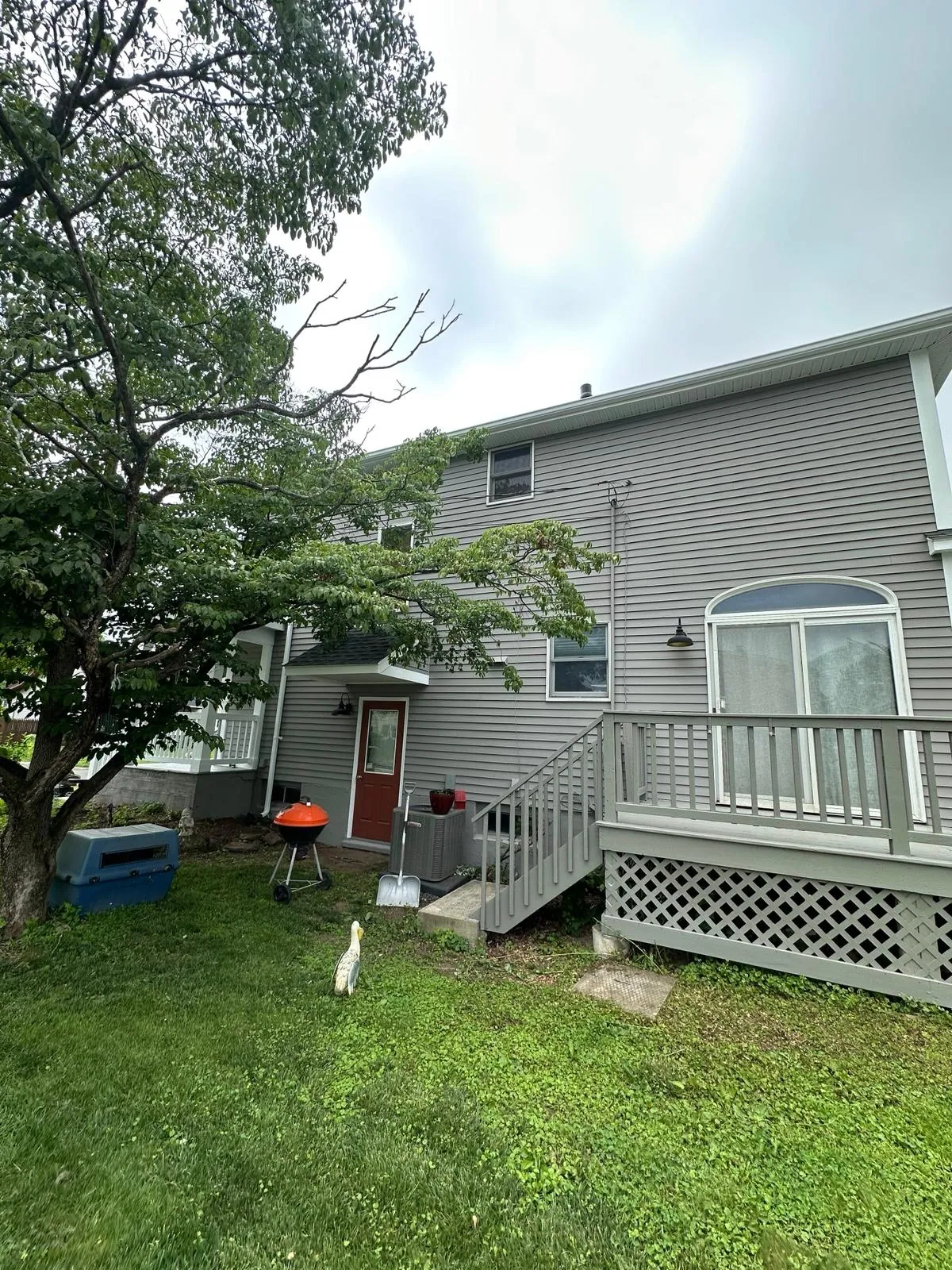 Rear of the home, siding and railings finished