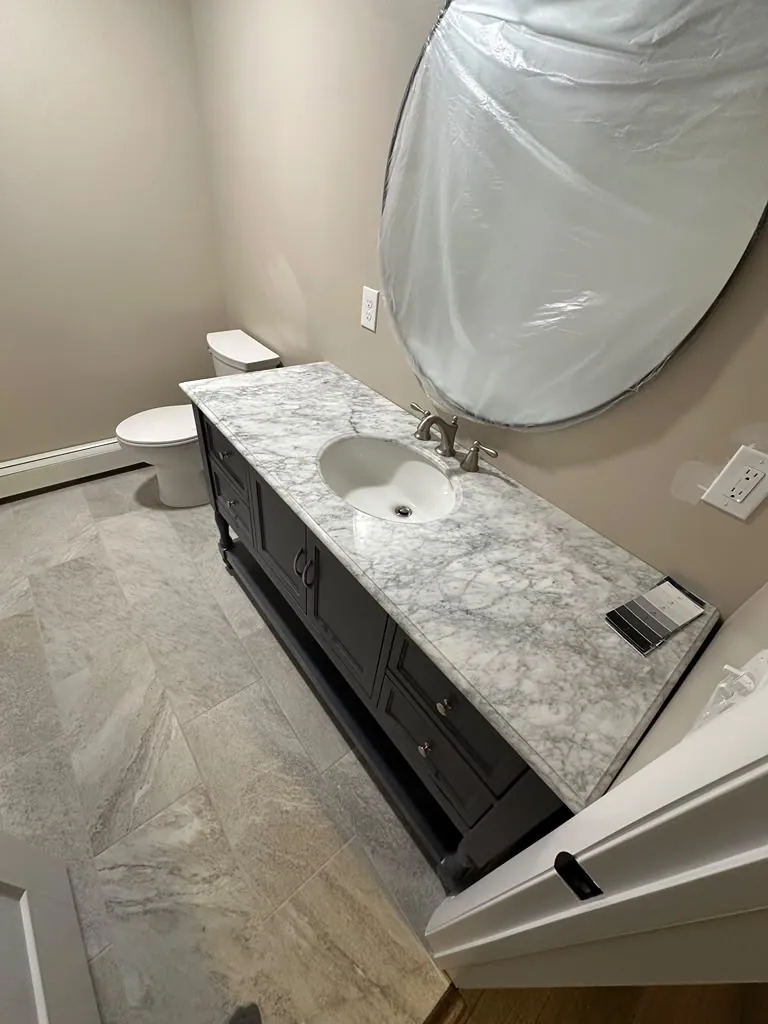 Powder room repaint, careful cut lines around fixtures