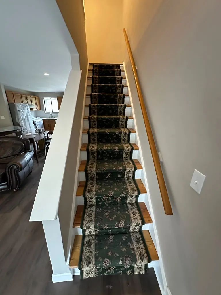 Stairwell walls and railing wall painted clean